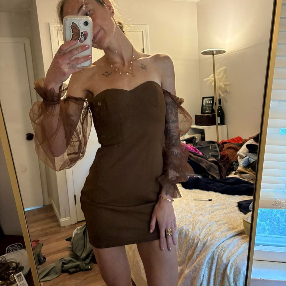 Brown mini dress with long puffy sleeves and mesh overlay